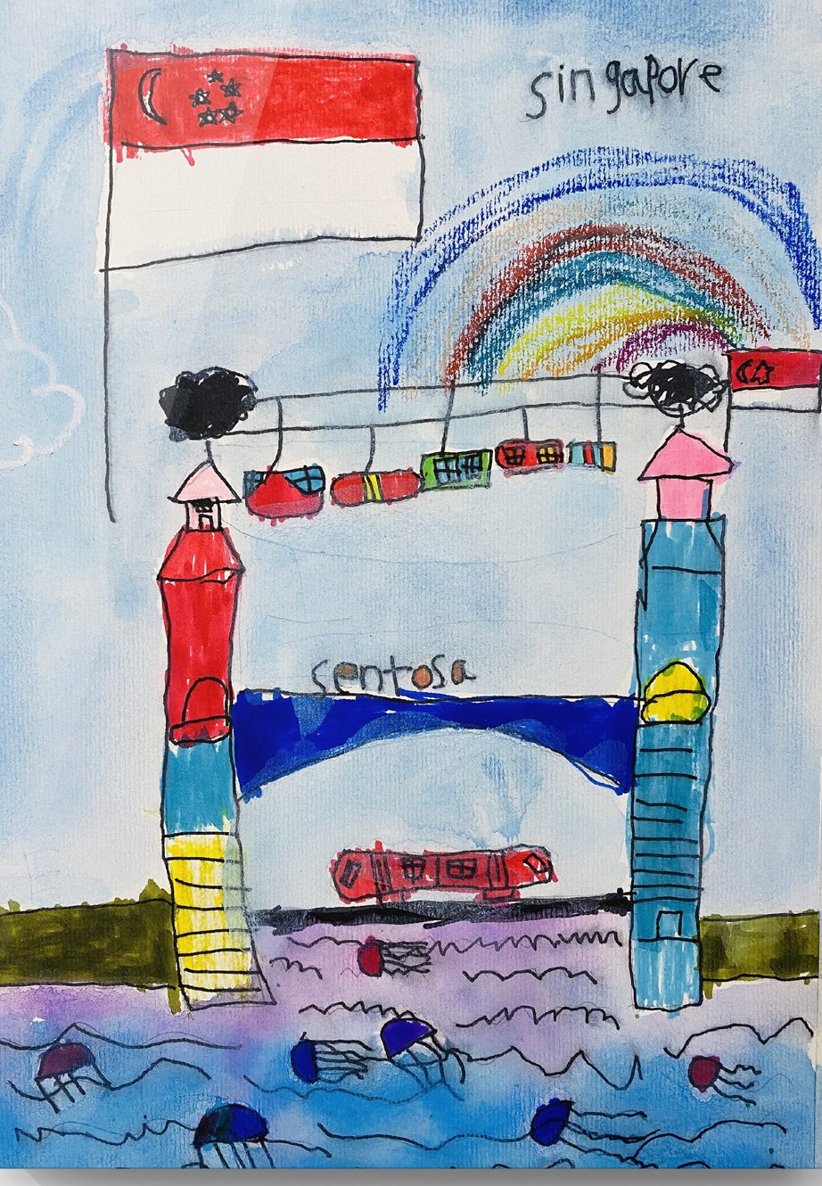Child's watercolour and oil pastel painting of the Singapore flag, a crayon rainbow and Sentosa cable cars above a jellyfish sea