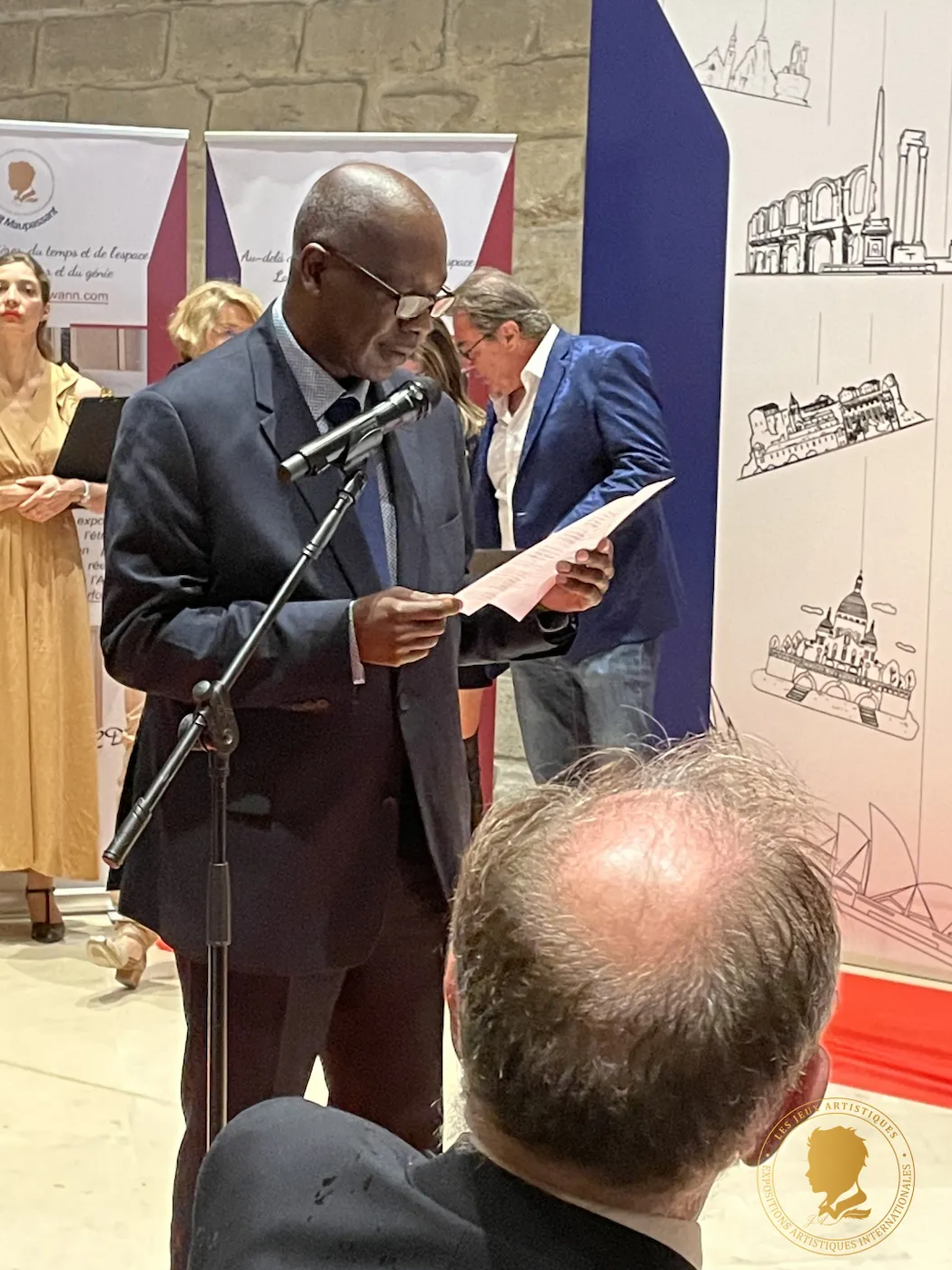 A guest speaking at a previous exhibition