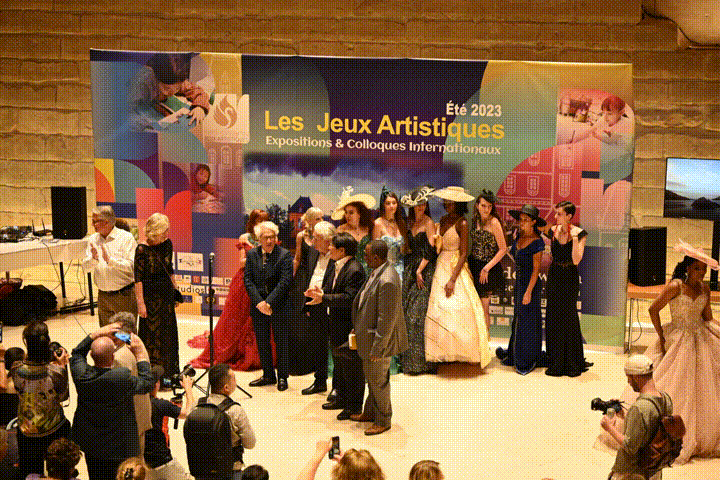 Guests gathered on stage at a previous exhibition