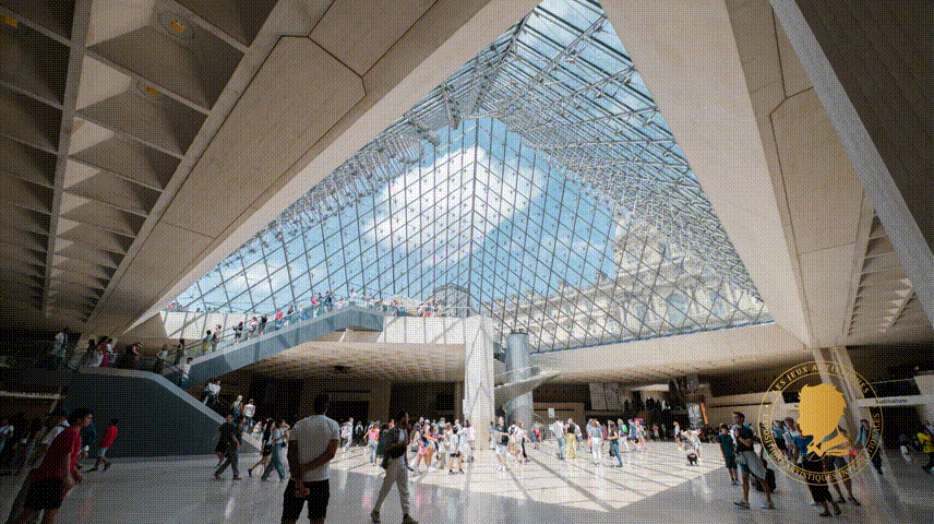 Visitors beneath the glass pyramid of the Louvre