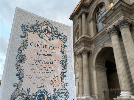Victoria competition certificate photographed outside a museum