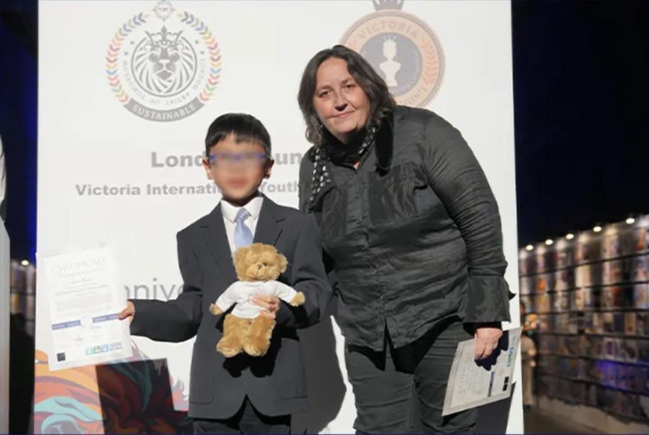 A young award recipient with competition judge Jo Ruxton